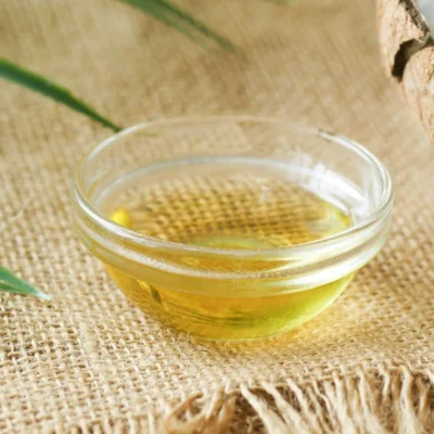 Coconut halves with oil 01